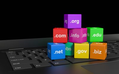 Internet Domain Names Cubes on a Laptop Computer Keyboard 3D Illustration